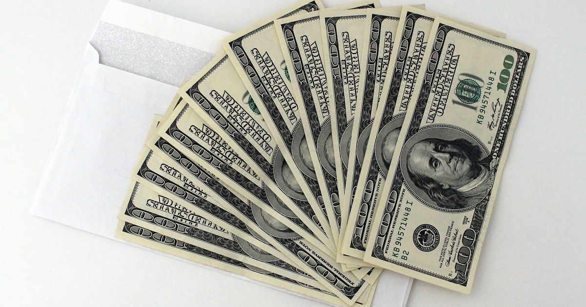 pdpm payment boosts - 100 dollar bills on envelope