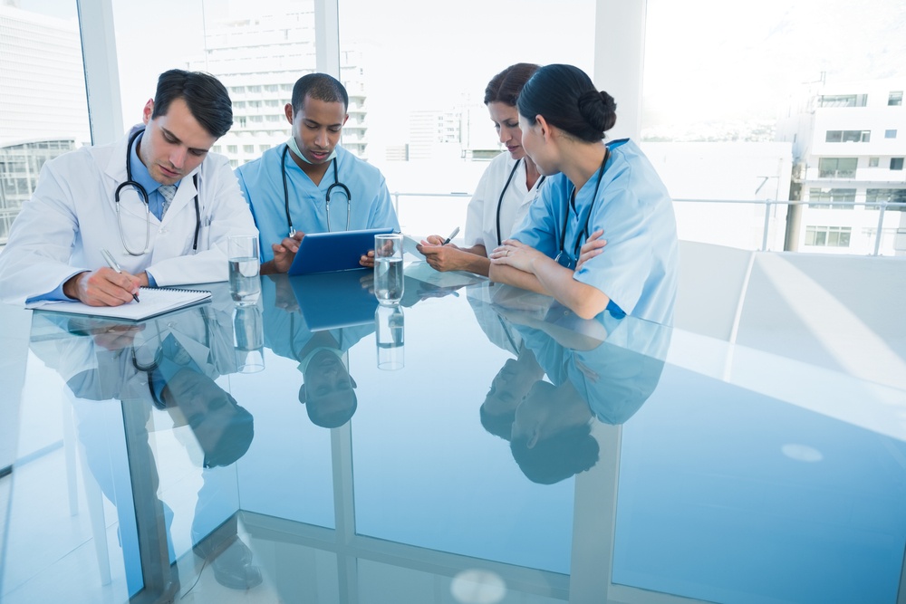 Group of young doctors in a meeting at hospital